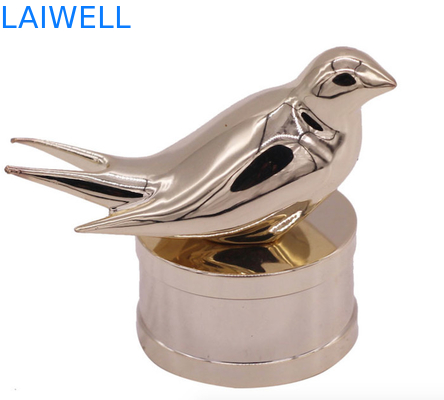 Bouchons de flacon de parfum en alliage de zinc modernes et tendance avec un design d'oiseau personnalisé pour les parfums haut de gamme